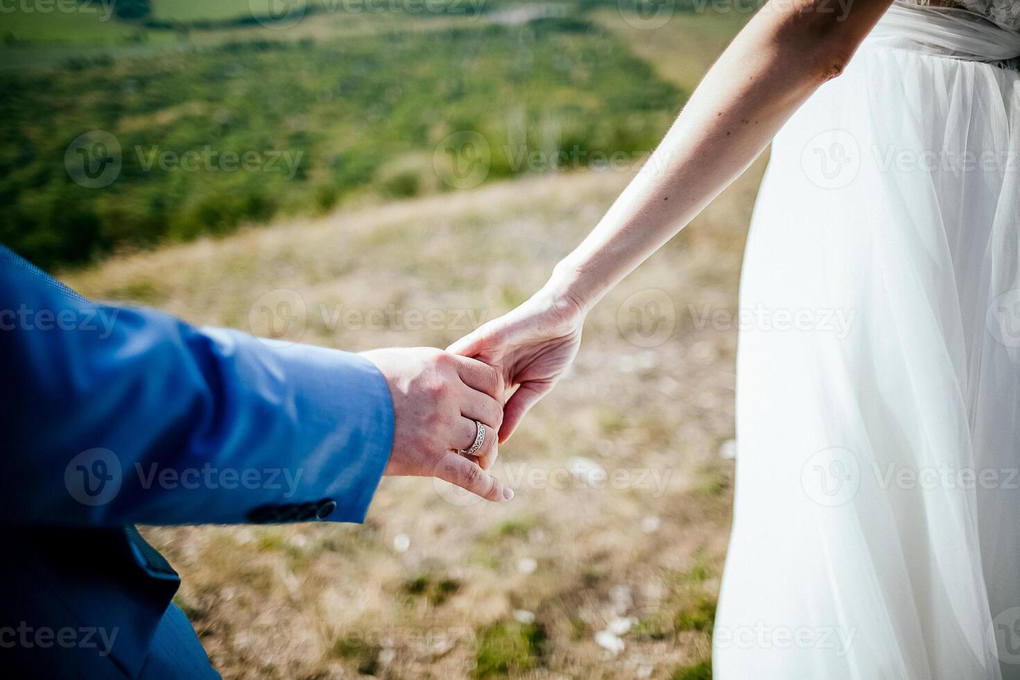 Close-up of a woman and a man holding out their hands, two people holding hands. The symbol is a sign of sincere feelings, a loved one. the concept of true friendship, outdoors photo