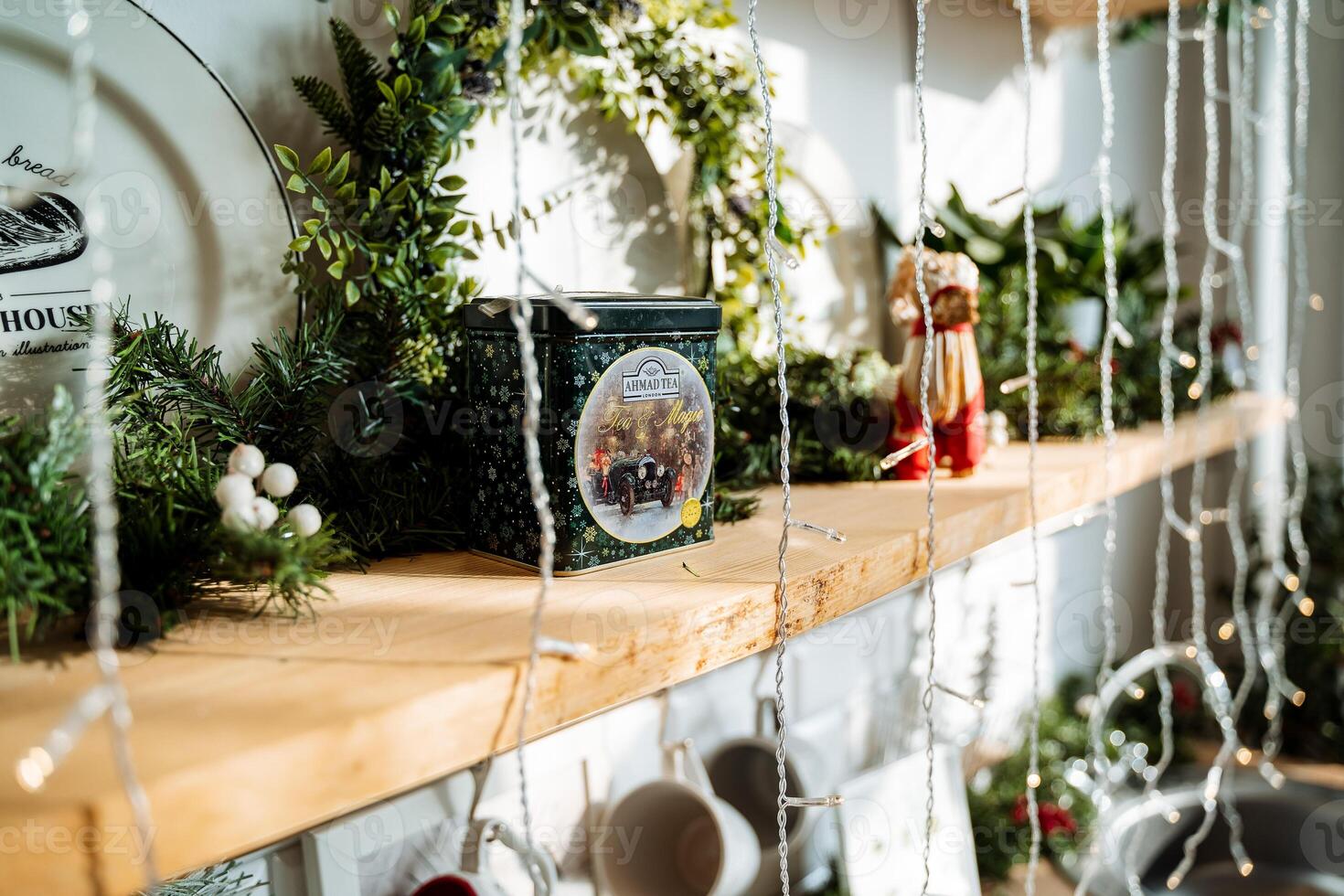 Christmas decor on a shelf in a kitchen photo