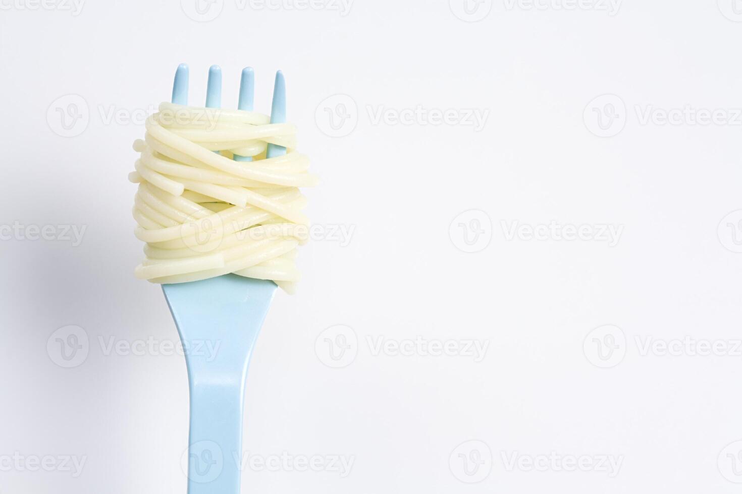 Spaghetti wrapped around a fork photo