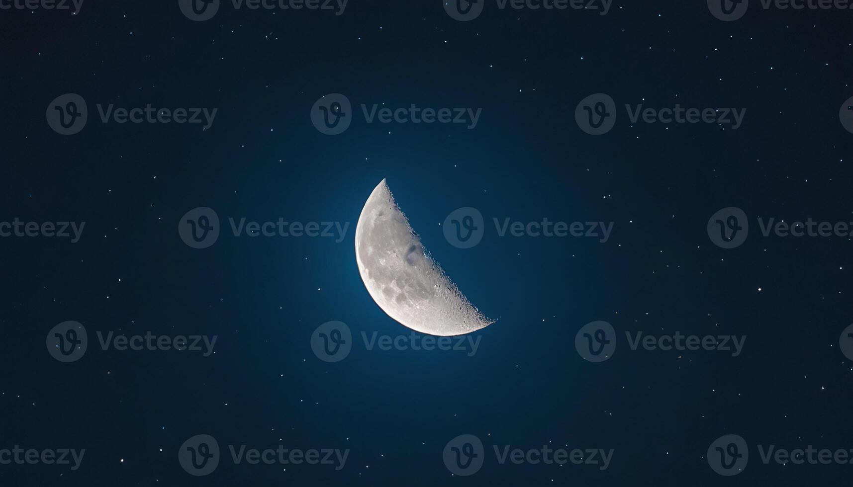 The moon is seen in the night sky photo