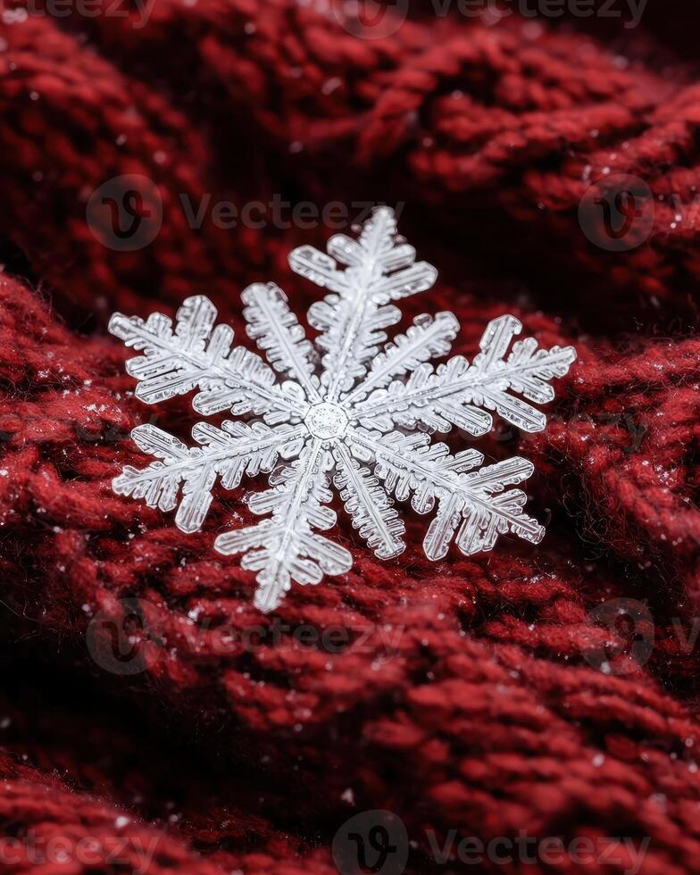 Intricate snowflake on a red background photo