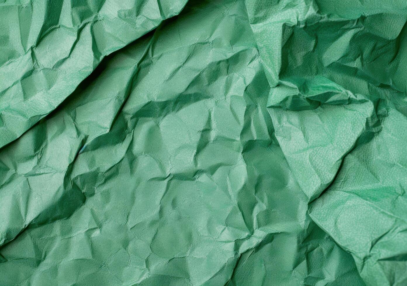 crumpled green tissue paper background photo