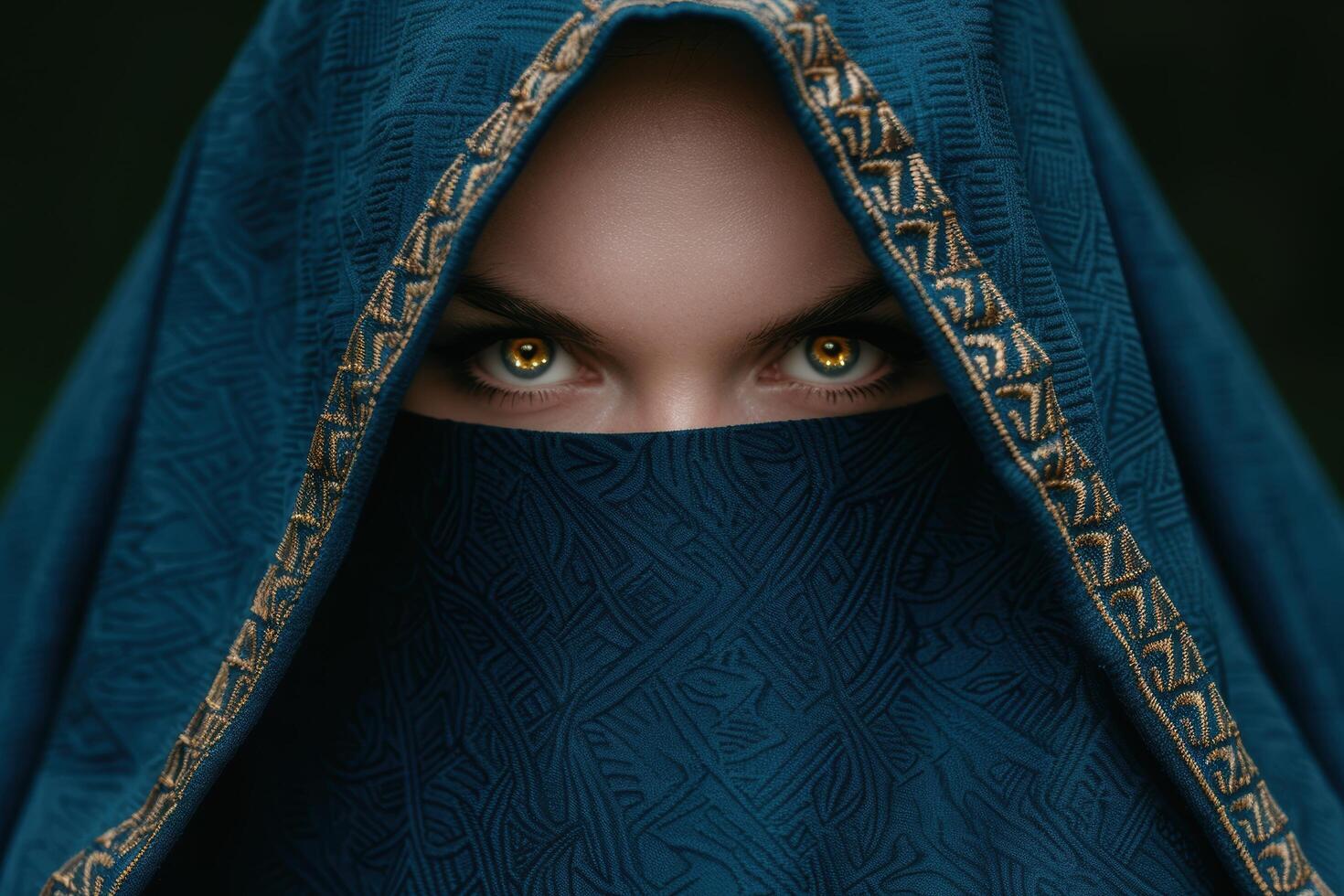 mysterious woman in blue and gold veil photo