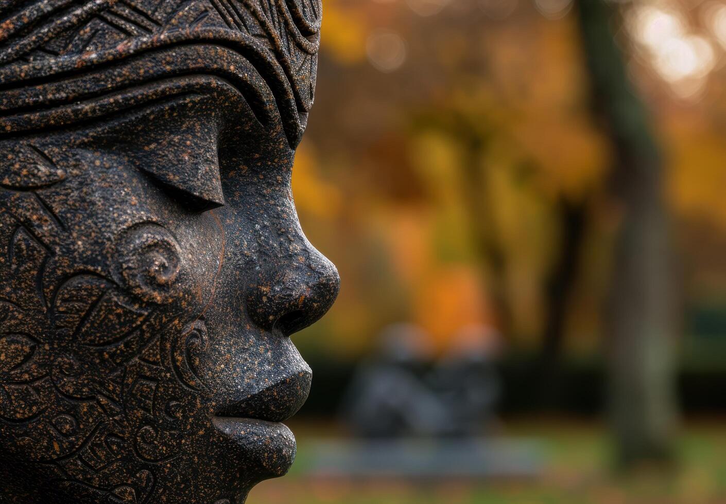 close up of ornate stone sculpture in nature photo