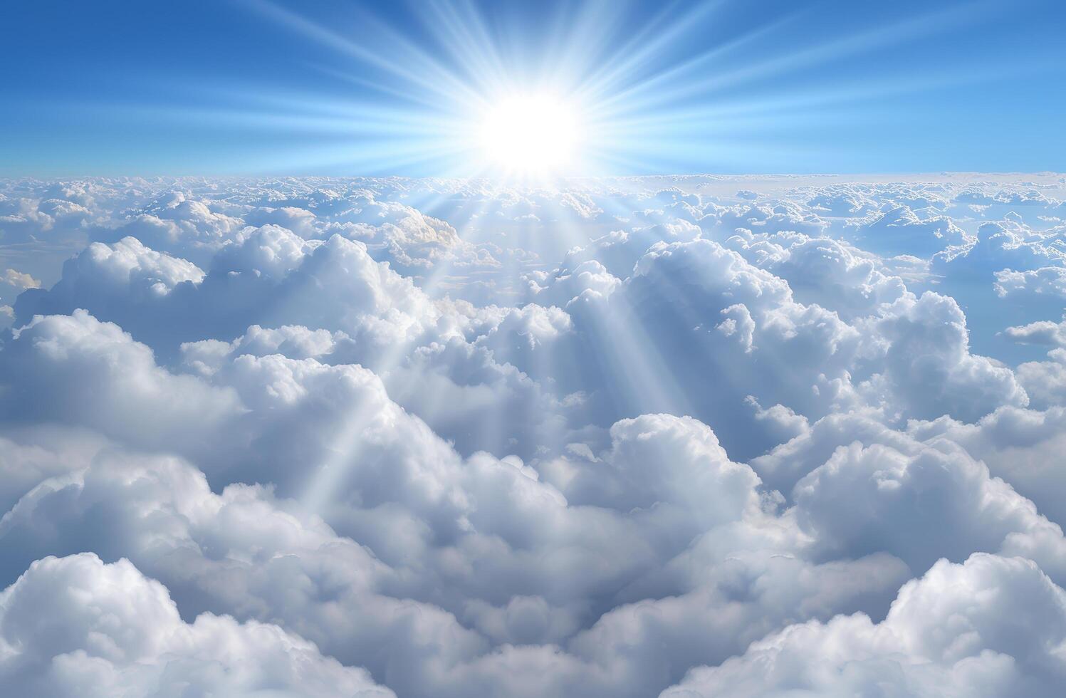 Bright sun shining through fluffy white clouds in blue sky photo