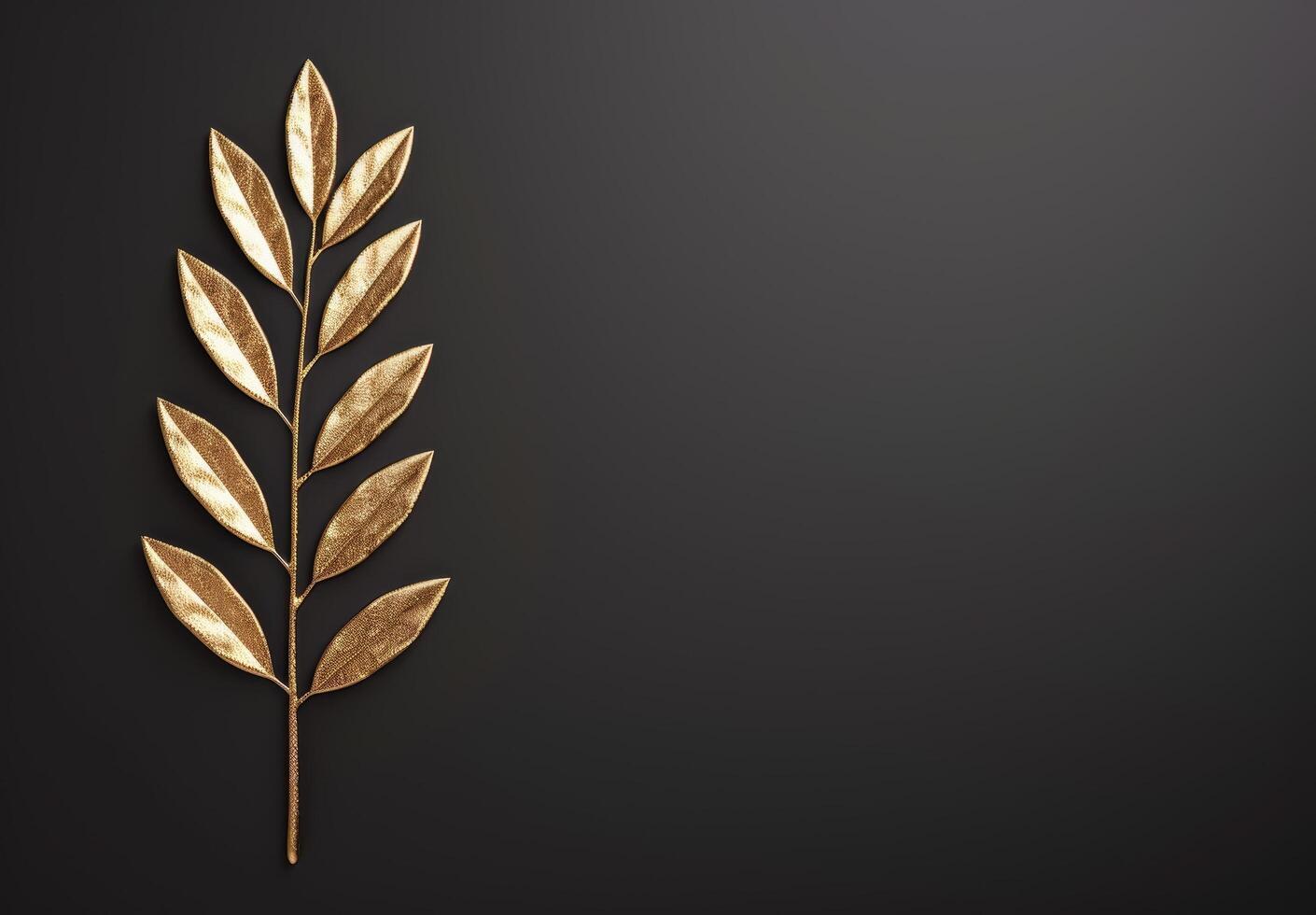 golden leaf branch on black background photo