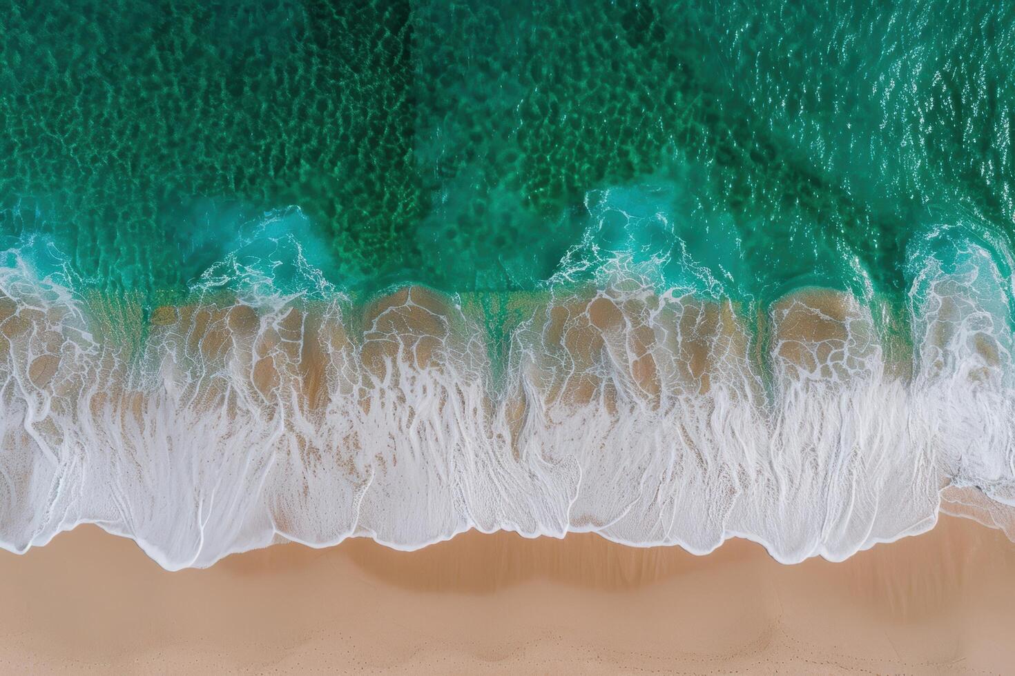Aerial view of a tropical beach with turquoise waves photo