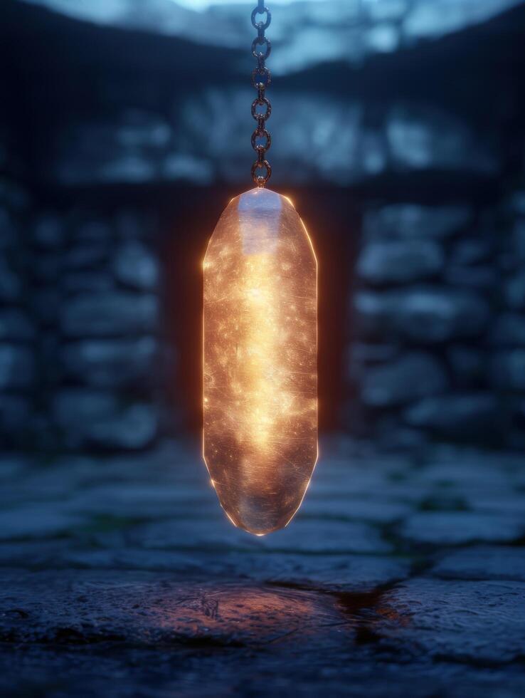 Glowing crystal pendant in dark night sky photo