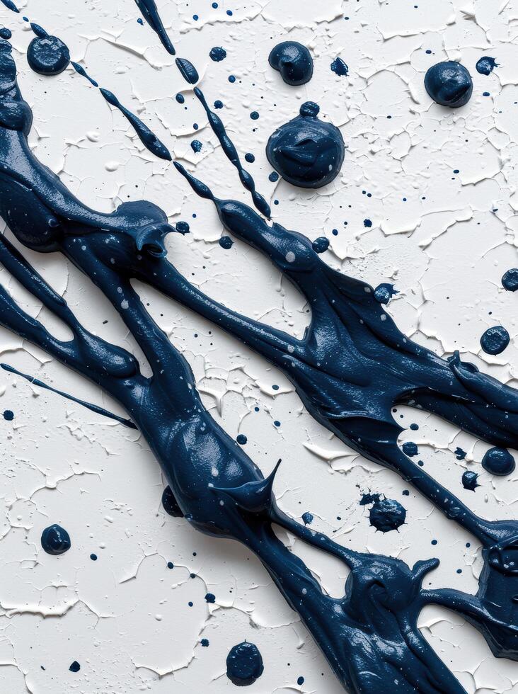 Artistic abstract black paint splatter on white background photo
