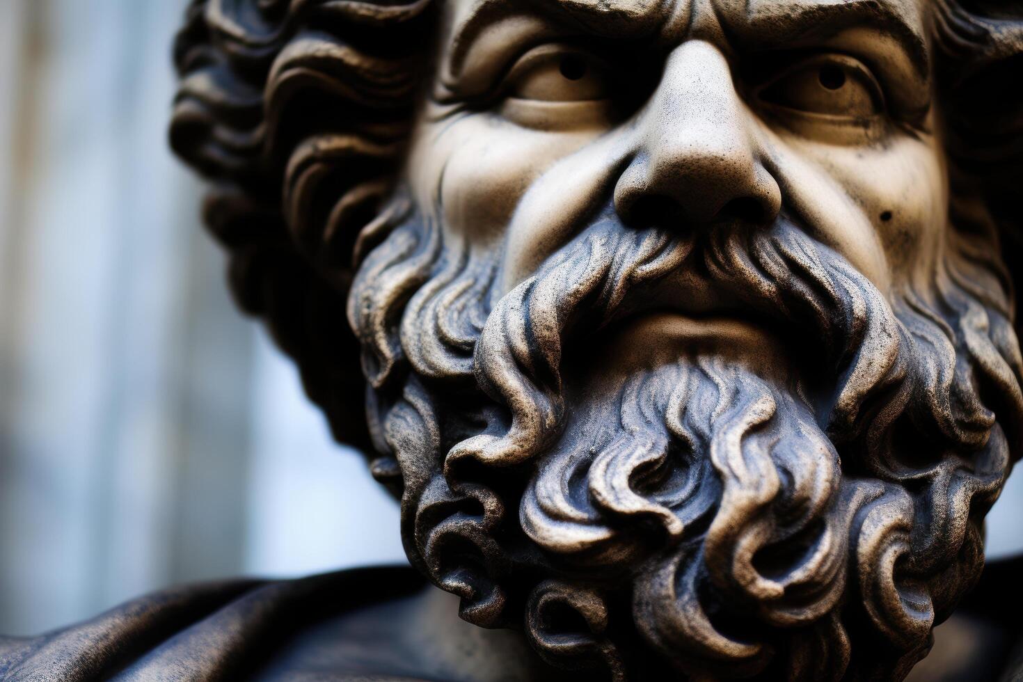Close up portrait of a weathered stone sculpture photo