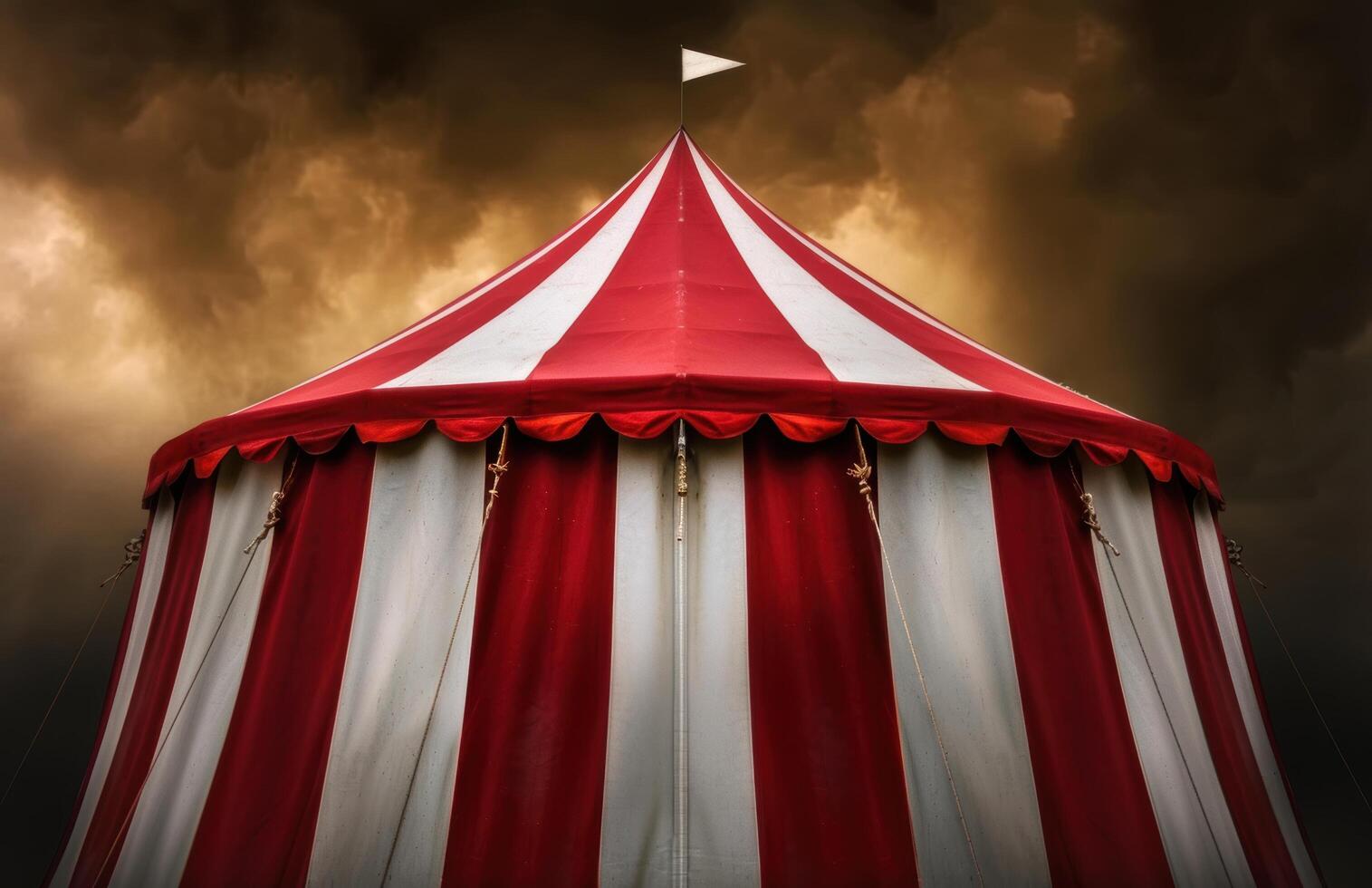 Dramatic circus tent against stormy sky photo