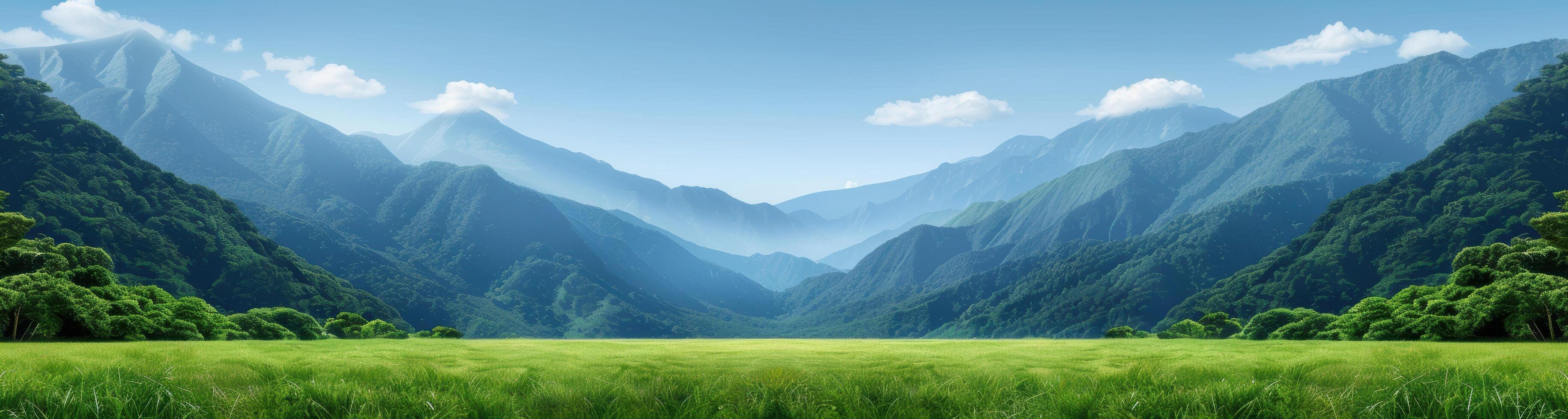 Serene mountain landscape with lush green meadow photo