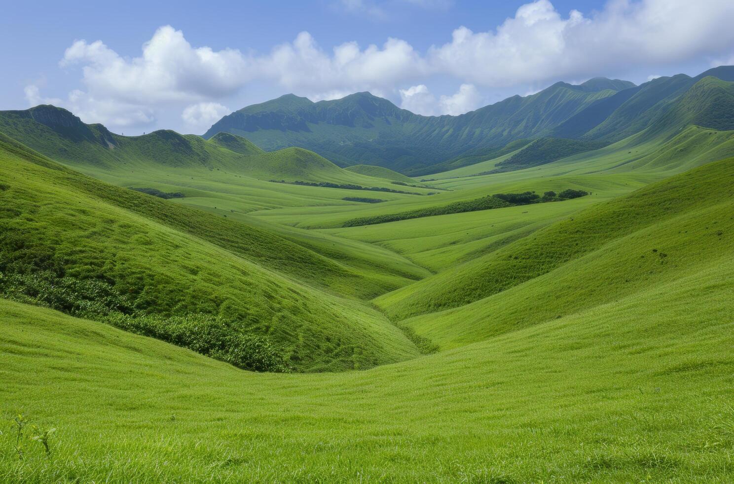 Lush green mountain landscape with rolling hills photo