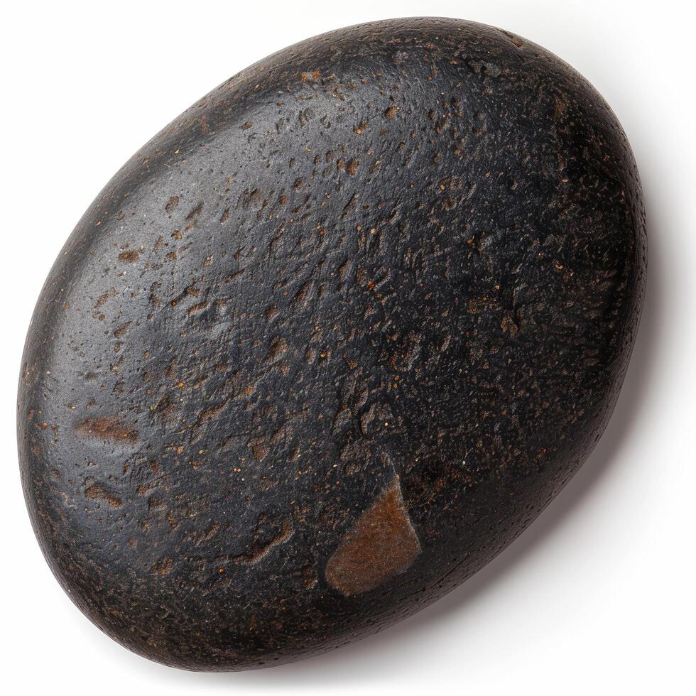 Closeup of a dark, textured stone or rock photo
