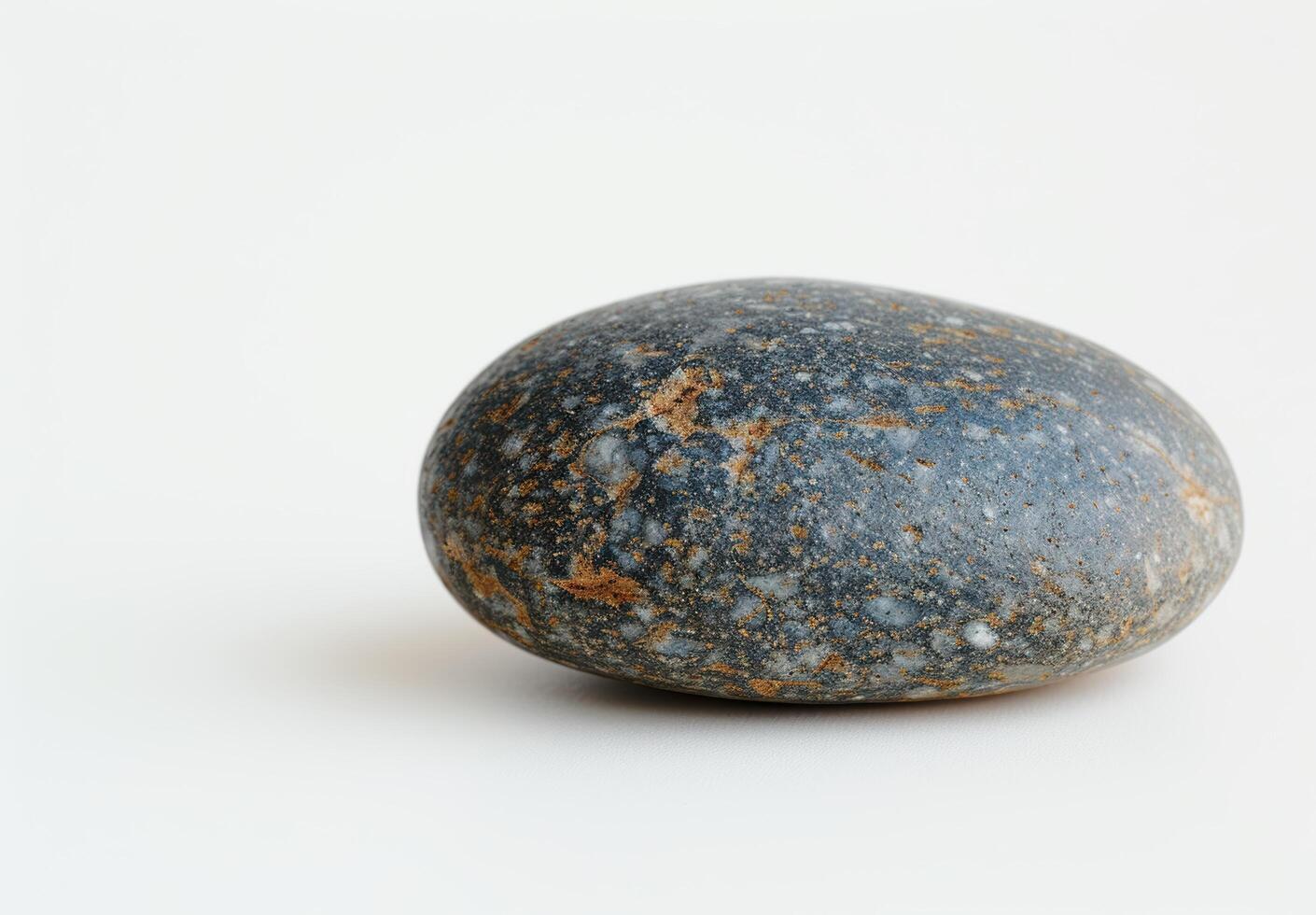 Smooth river rock with natural patterns photo