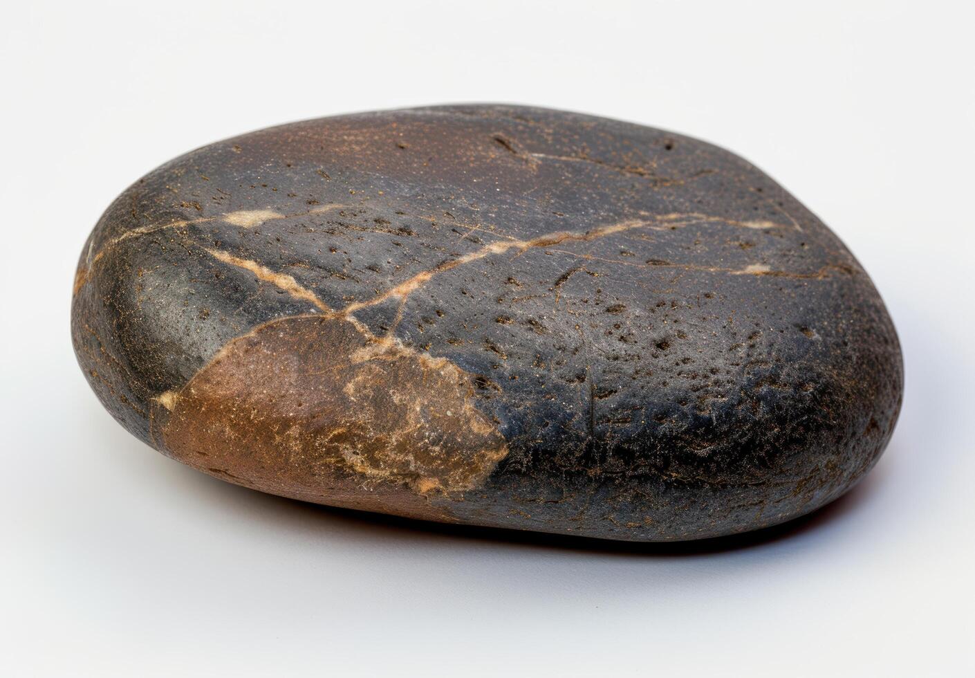 Smooth stone with intricate patterns photo