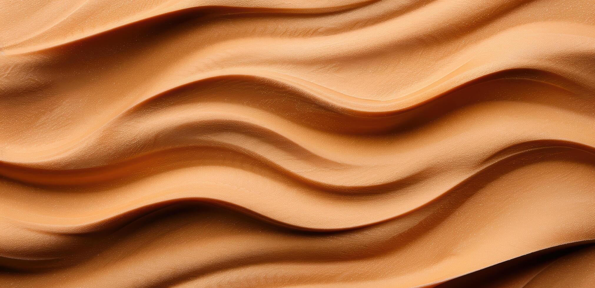 Smooth flowing sand dunes in the desert photo