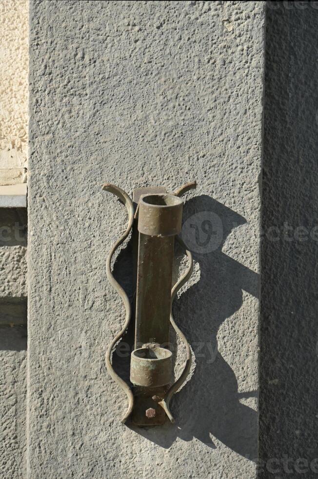 a wall with a clock on it photo