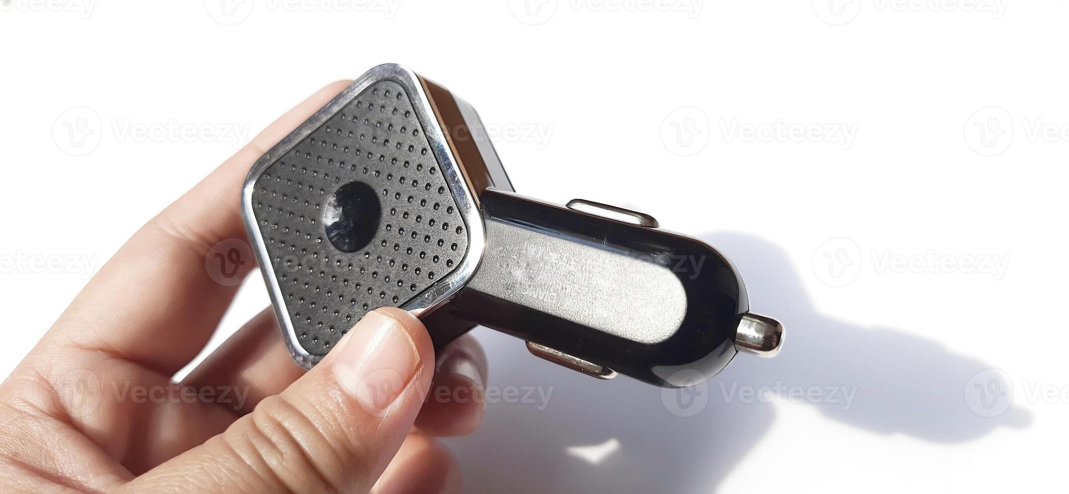 Dual port usb car charger isolated on white background. Fast charger for mobile phone photo