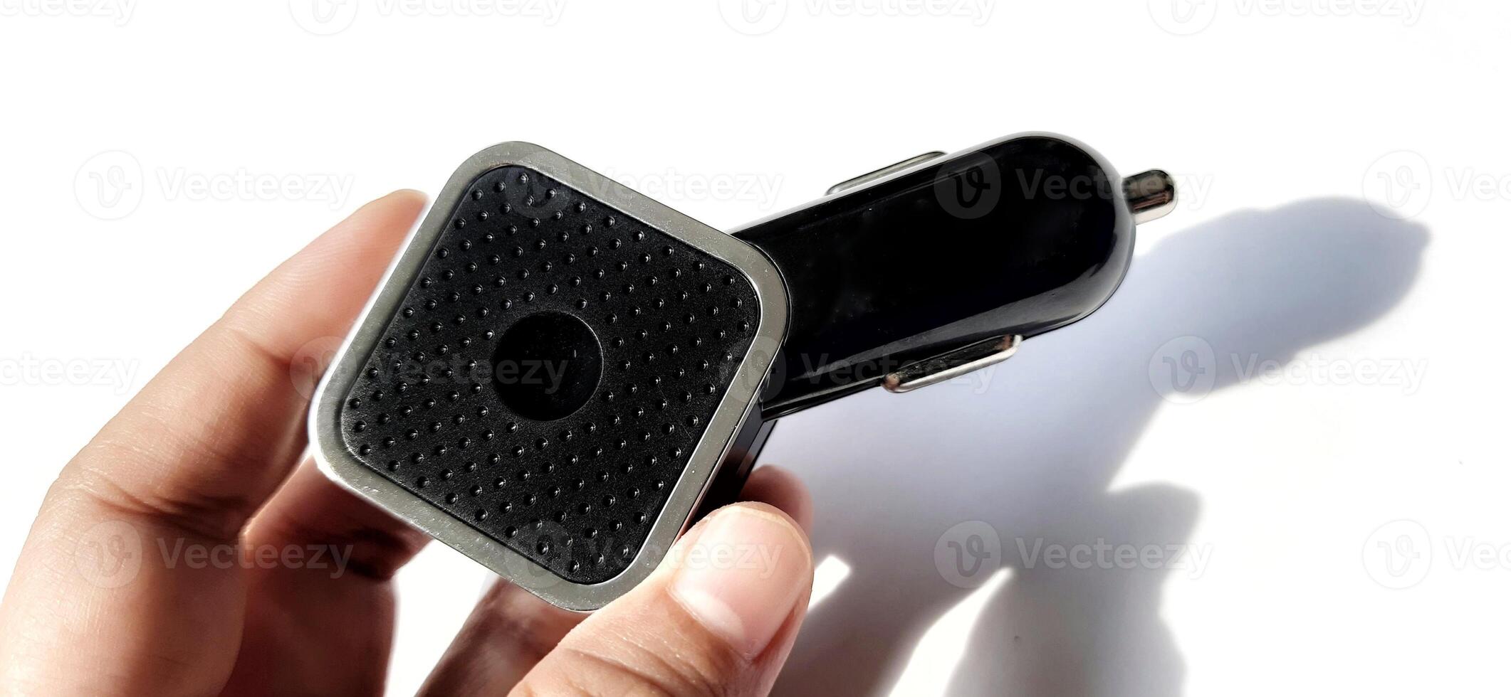 Dual port usb car charger isolated on white background. Fast charger for mobile phone photo