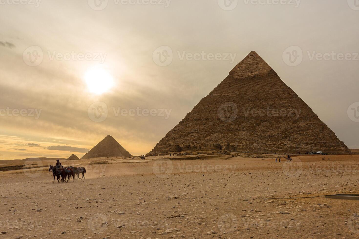 Famous great Giza Pyramids in sand desert in Cairo photo