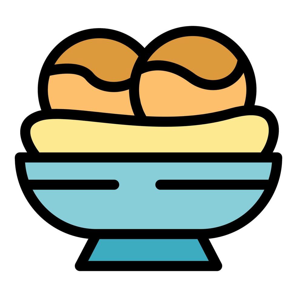 Two falafel balls resting on hummus in a bowl, a middle eastern culinary delight vector