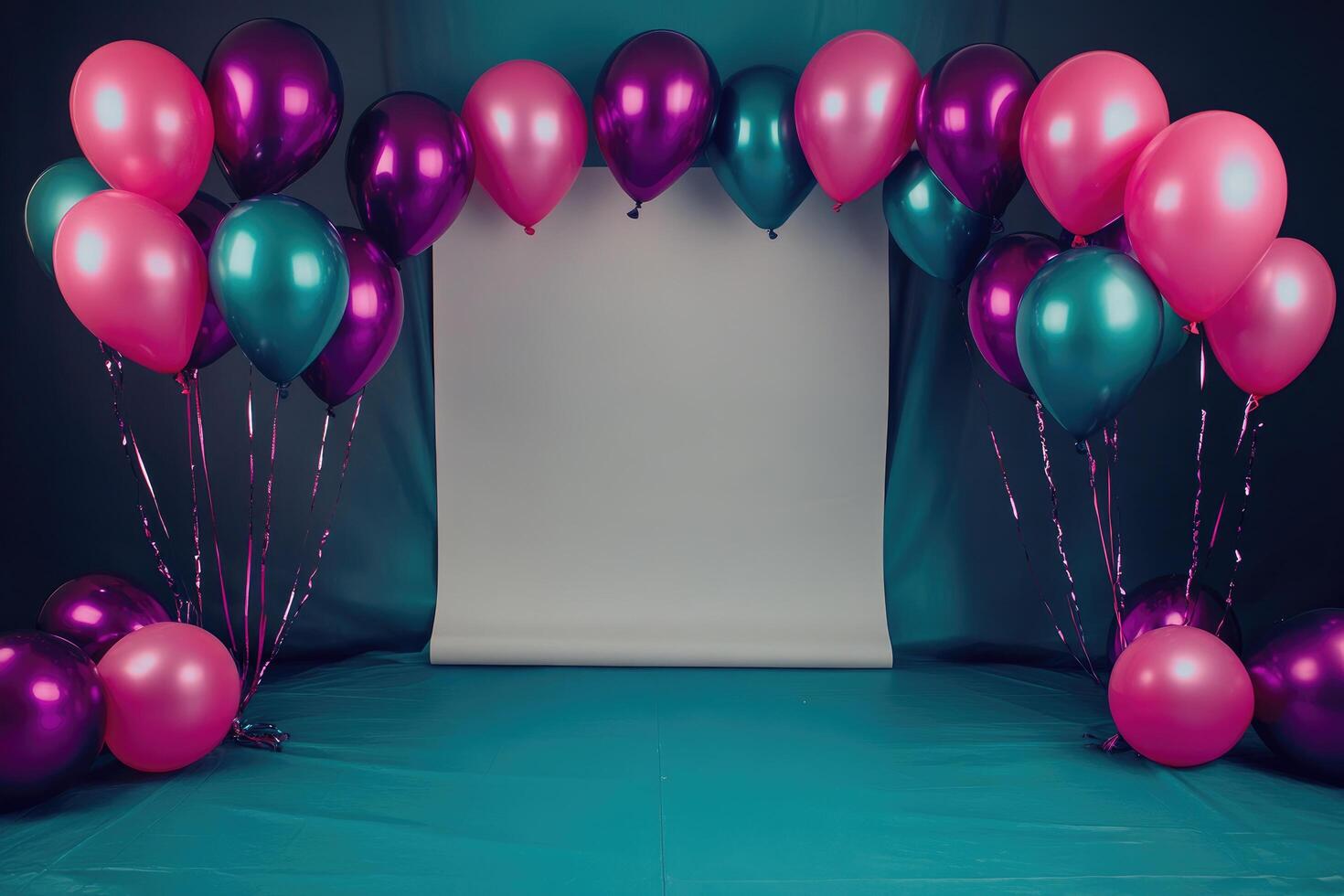 Pink and Teal Balloons Arcing Over White Paper on Teal Background photo