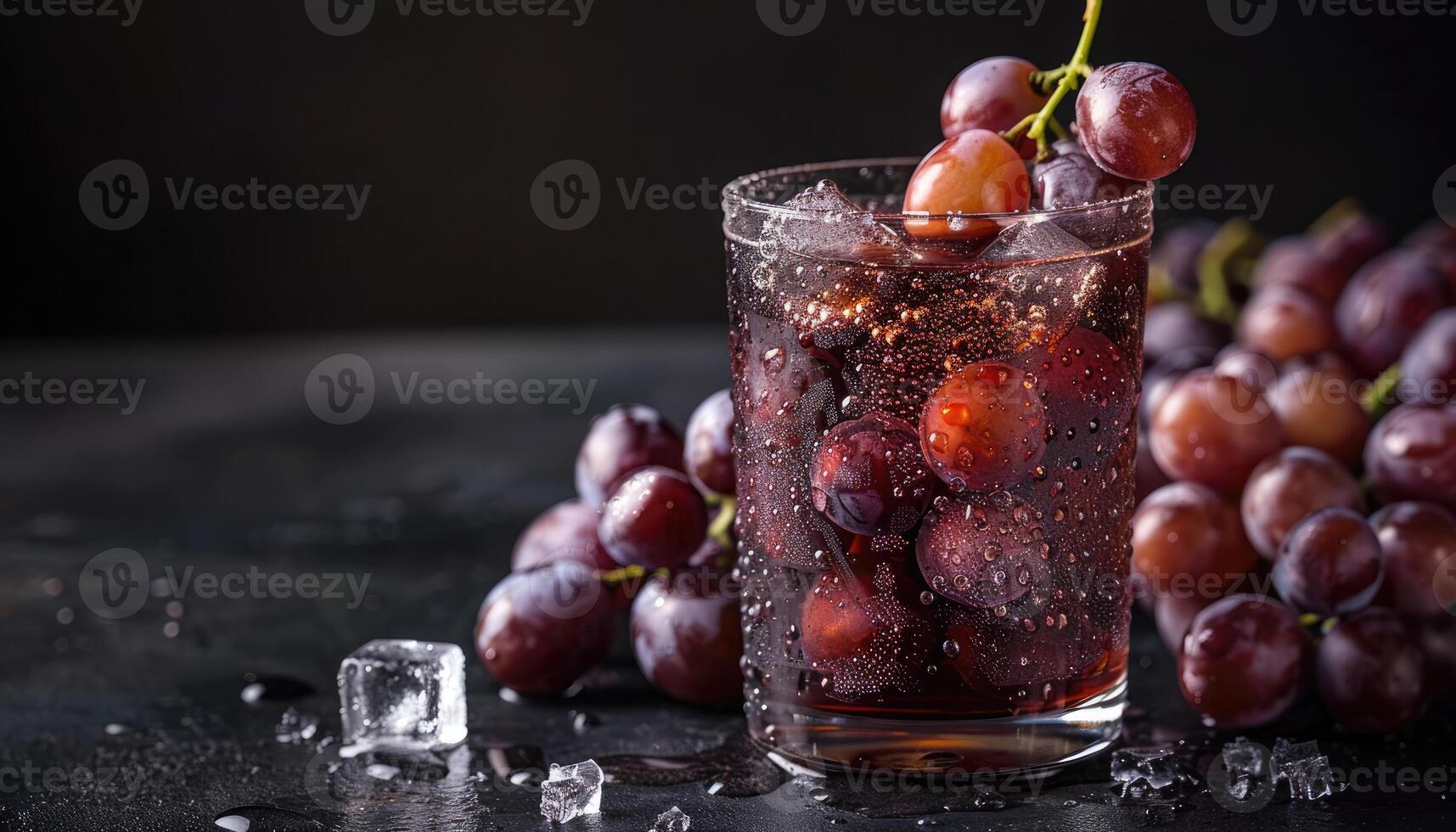 Grape Juice with Ice Cubes and Fresh Grapes photo