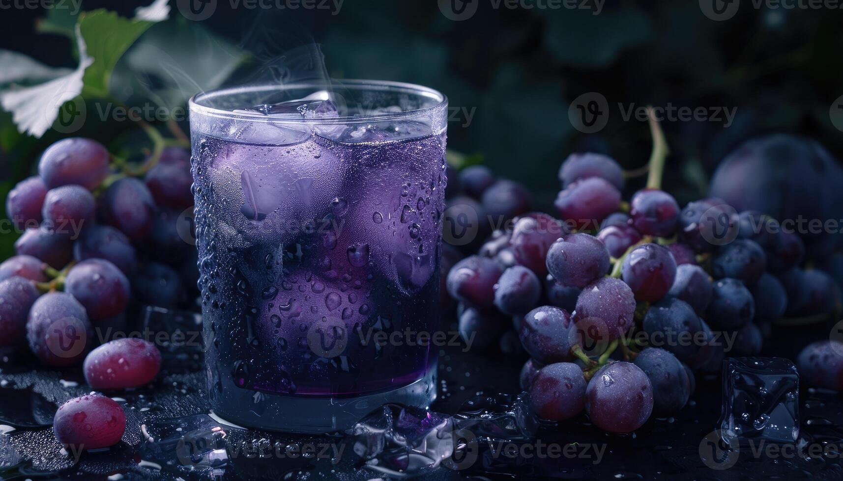A Glass of Icy Grape Juice with Fresh Grapes and Ice Cubes photo