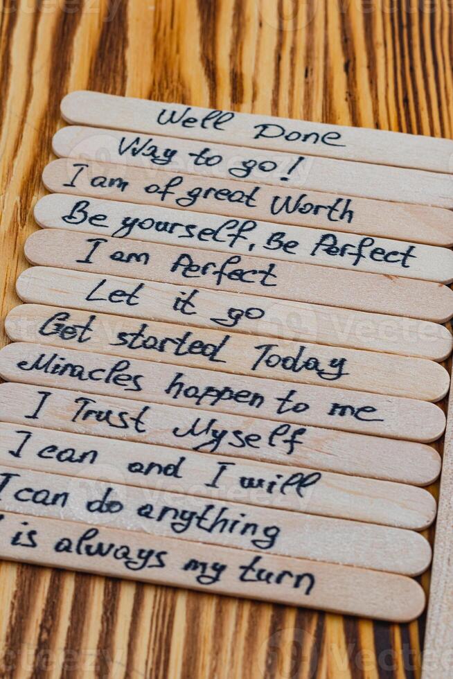 Done, positive thoughts for self esteem on wooden sticks photo