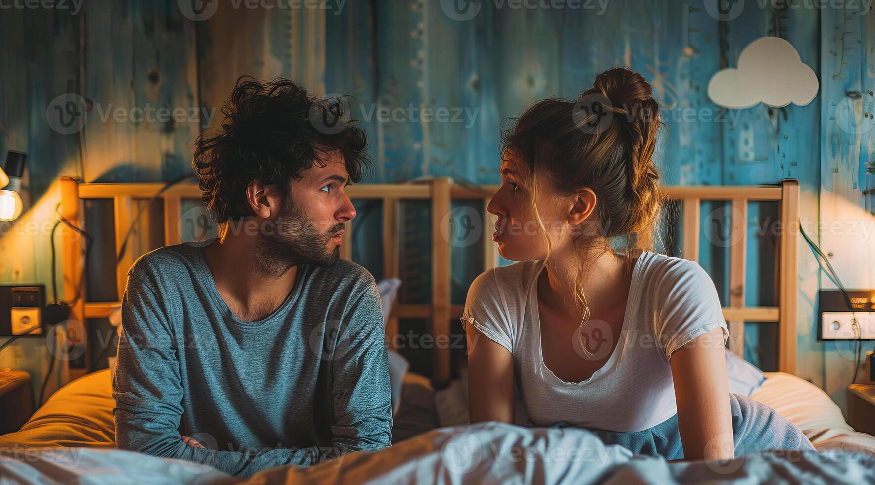 Married couple arguing in bed angry at each other trying to solve marriage problems. Negativity. photo