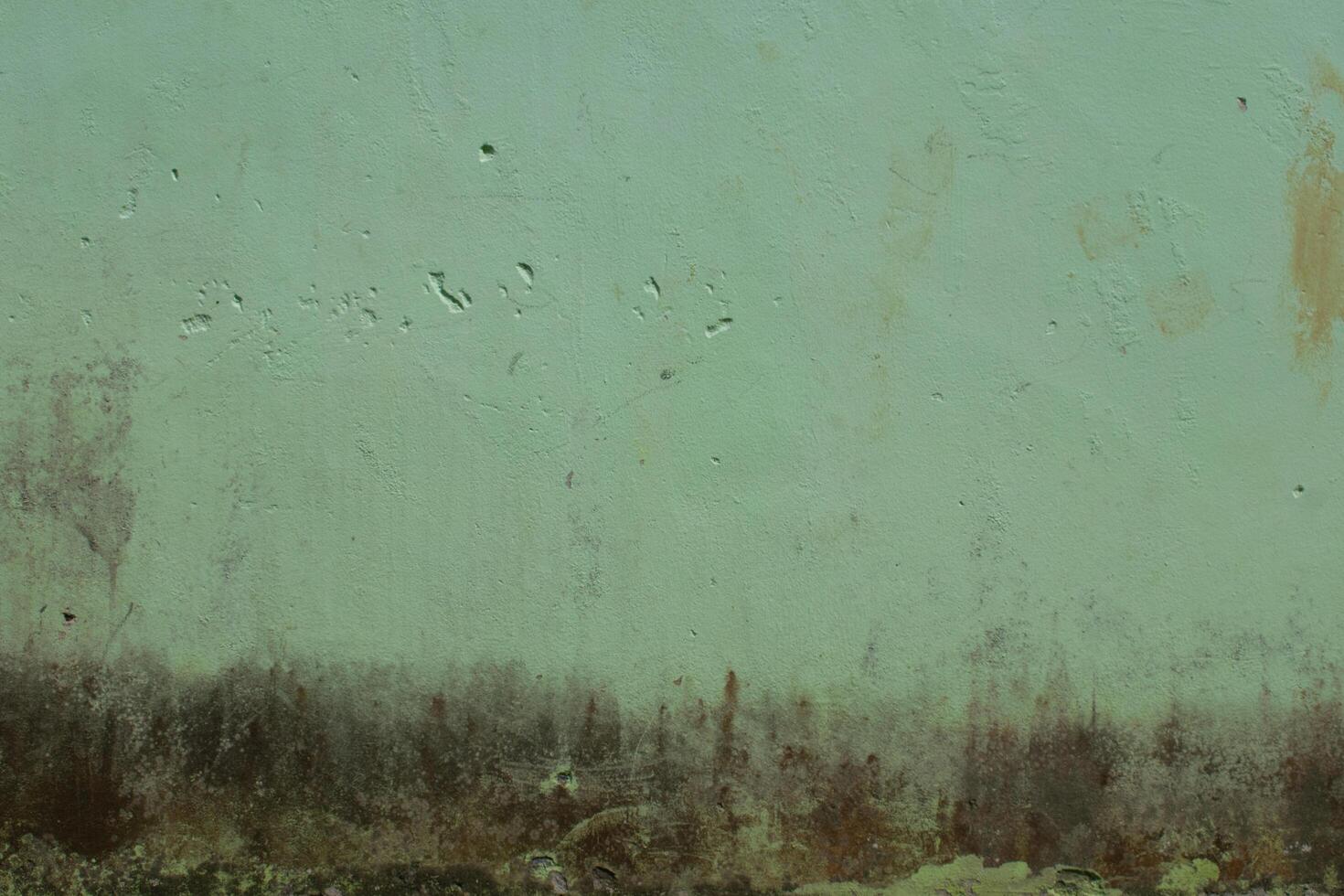 green paint colored cement wall background photo