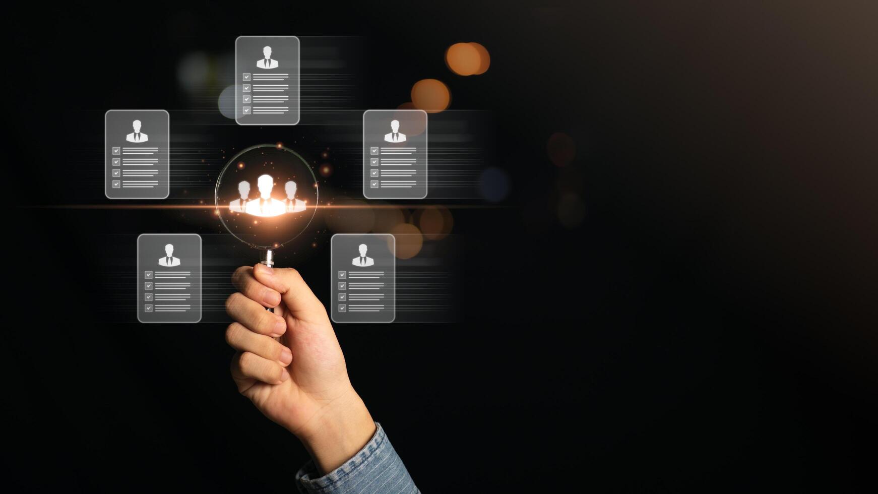 HRM or Human Resource Management,Strategic planning for success through people business development concept by choosing professional leaders employee competency Teamwork,magnifying glass in human hand photo