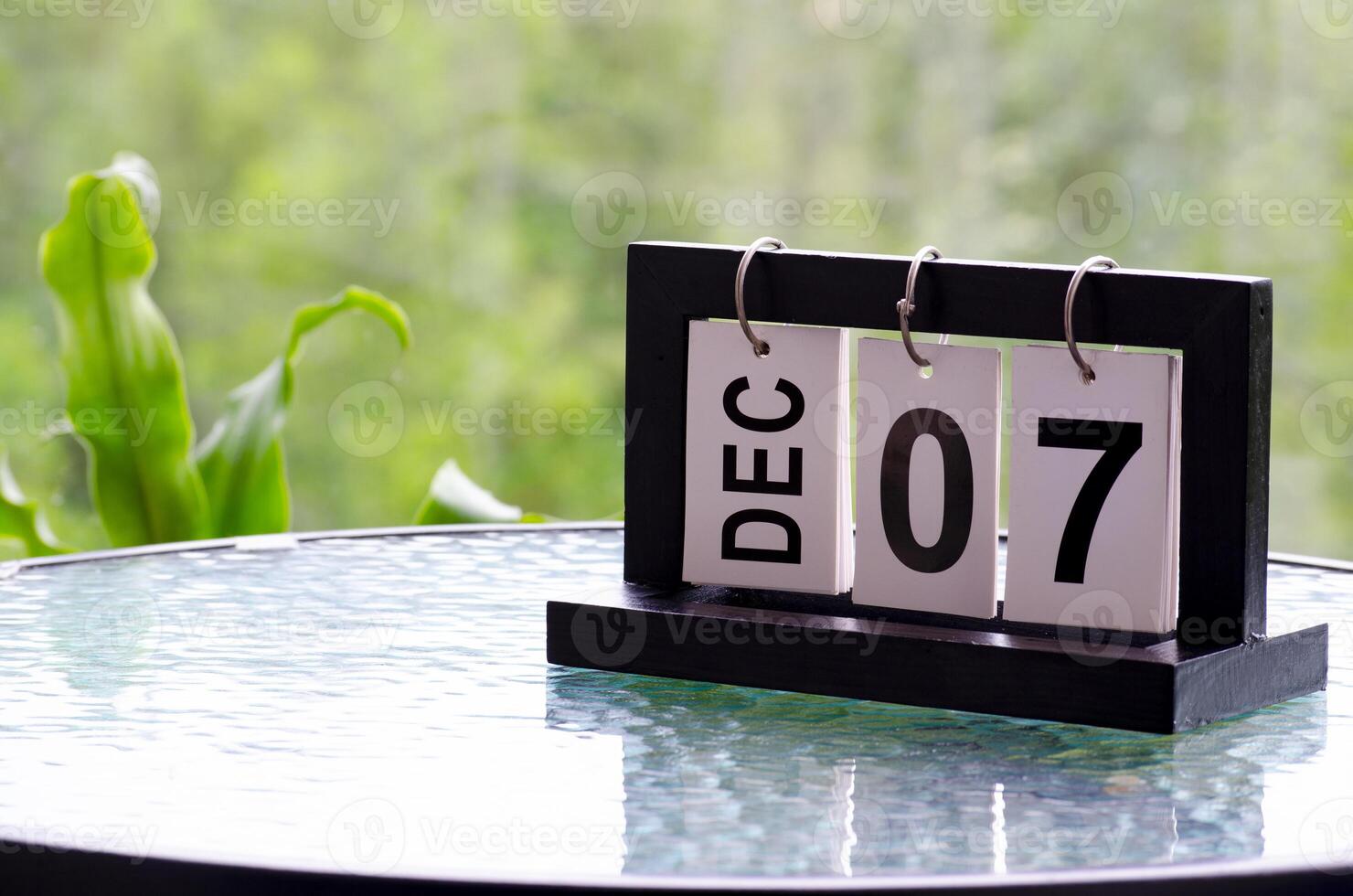 7 December calendar on marble table with customizable space for text. December calendar concept photo