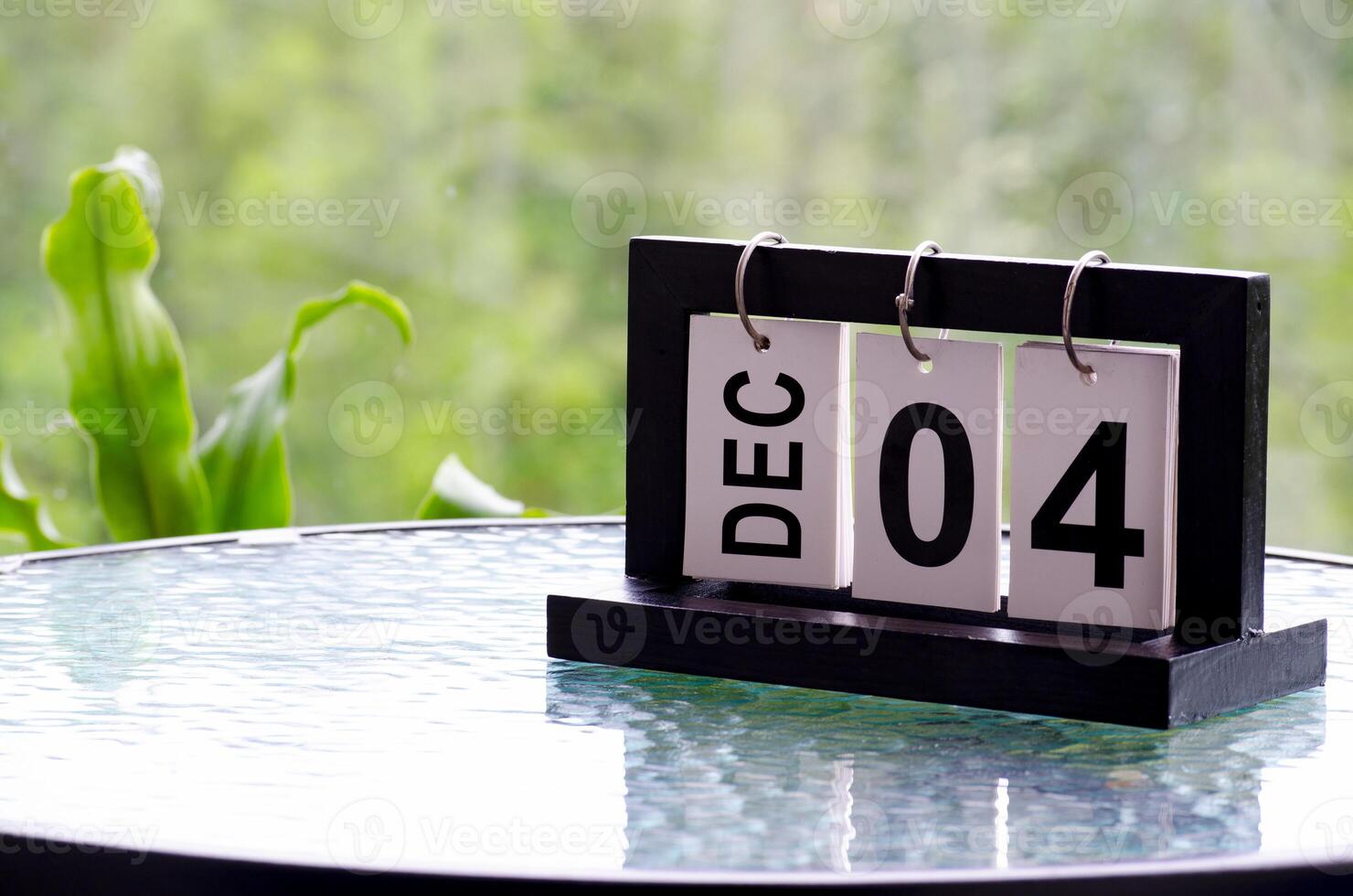 4 December calendar on marble table with customizable space for text. December calendar concept photo