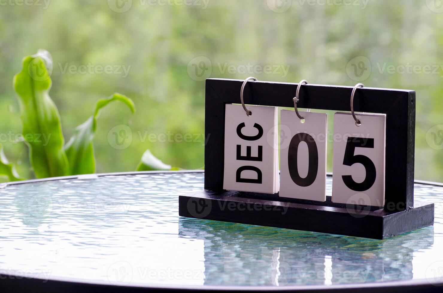 5 December calendar on marble table with customizable space for text. December calendar concept photo