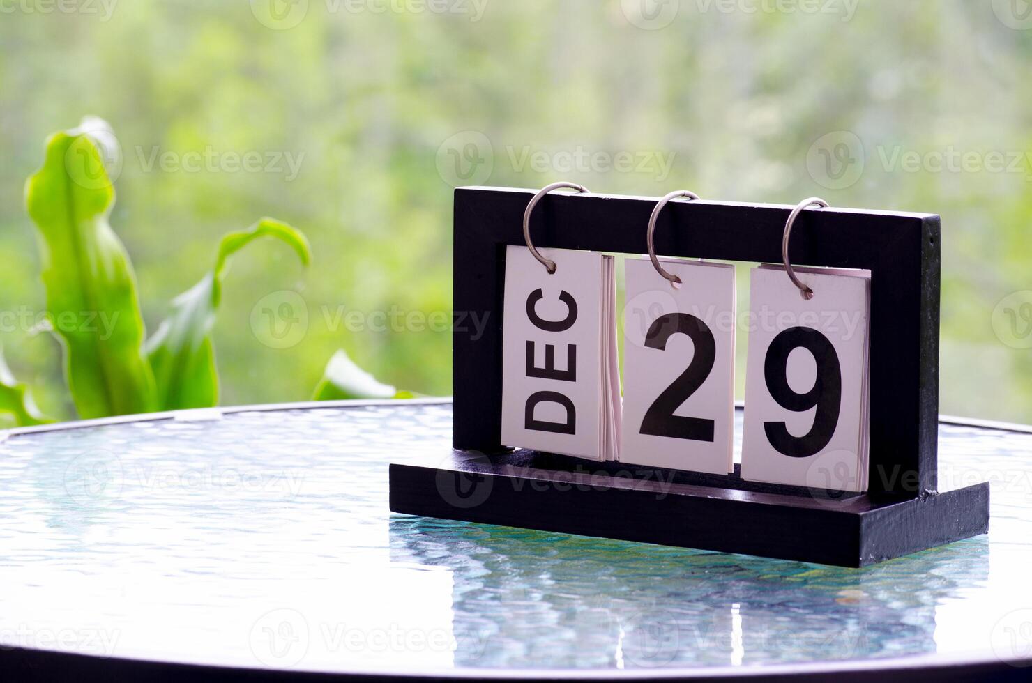 29 December calendar on marble table with customizable space for text. December calendar concept photo