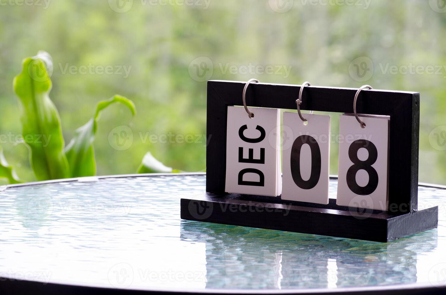 8 December calendar on marble table with customizable space for text. December calendar concept photo
