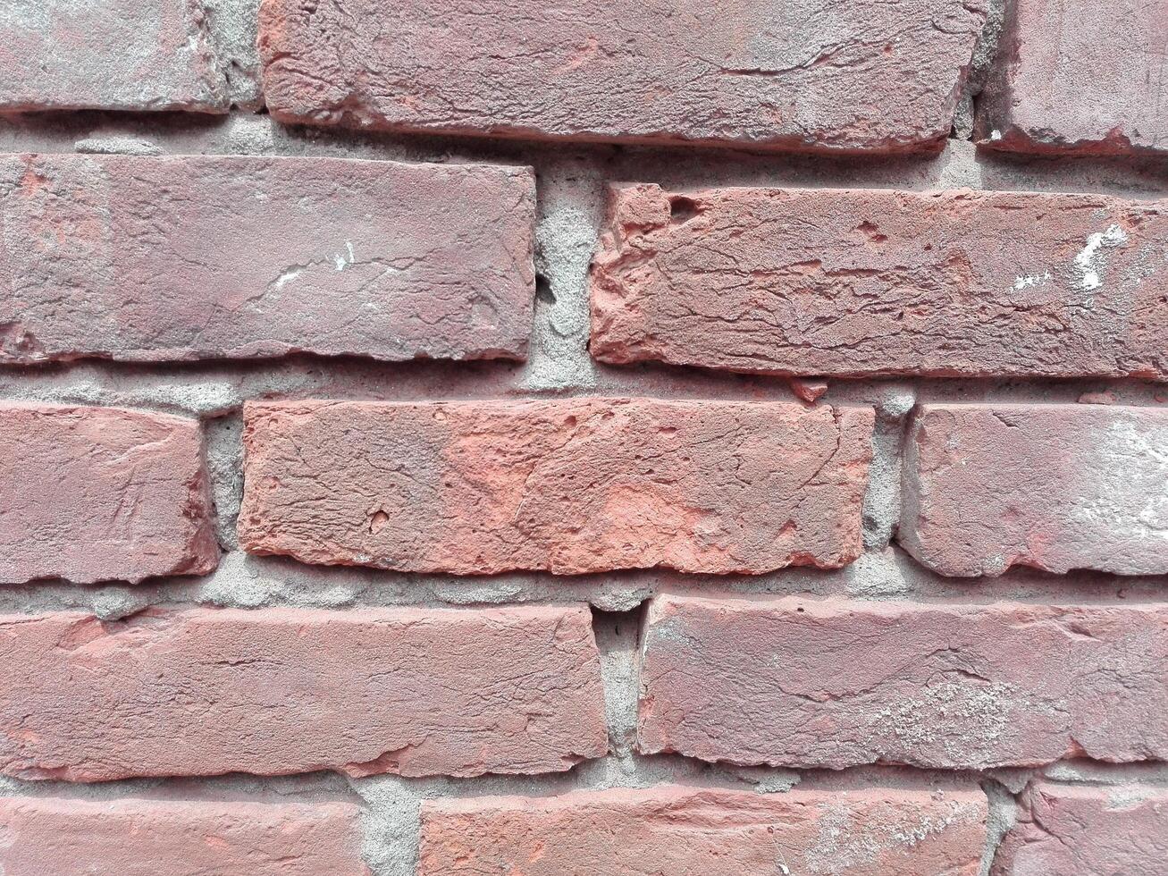 Close up view of red brick wall photo