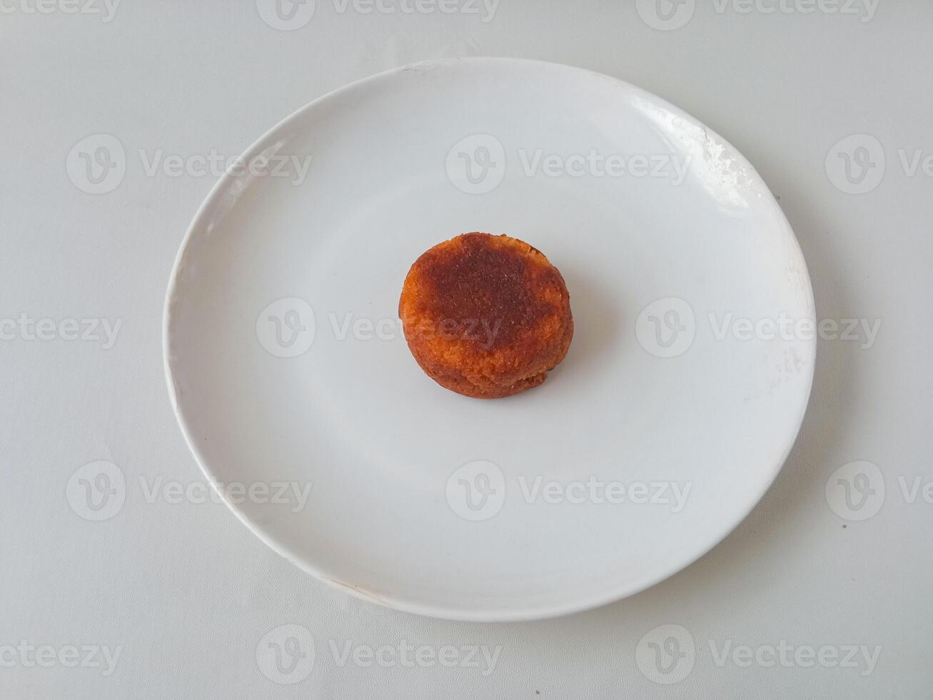 Wingko babat. Indonesian traditional food made from sticky rice isolate on white background. typical food photo