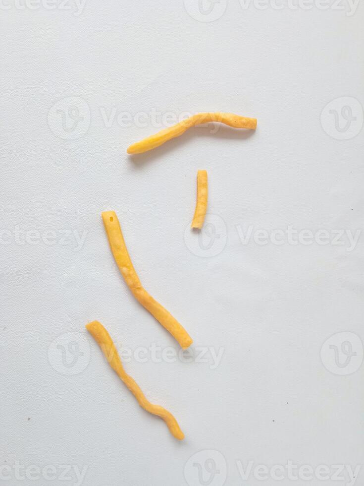 onion stick snack, delicious snack on plate isolate on white background. photo