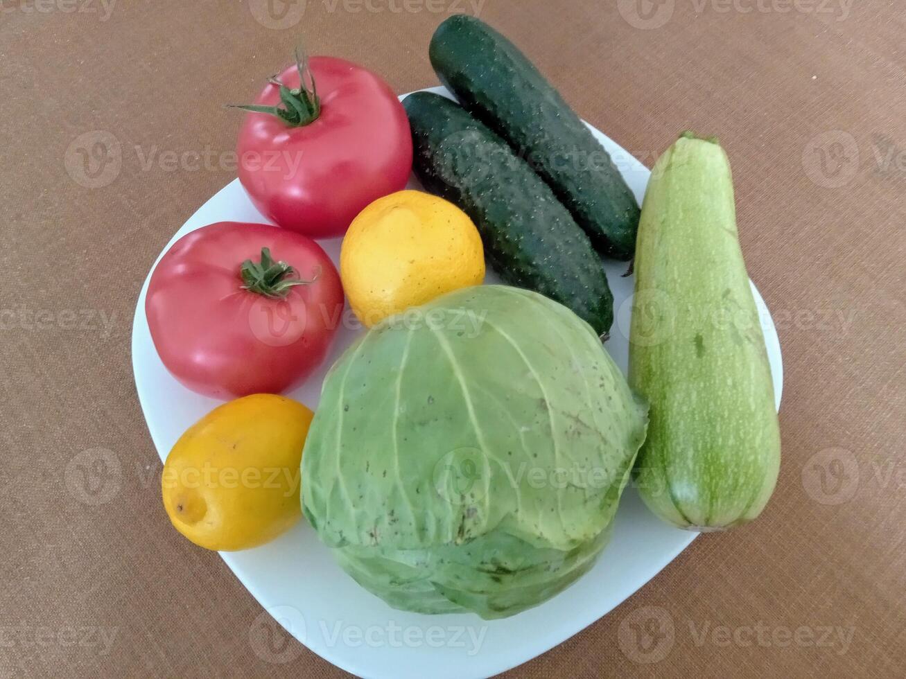 vegetable for soup, tomatoes, cucumbers, squash,lemon,cabbage photo