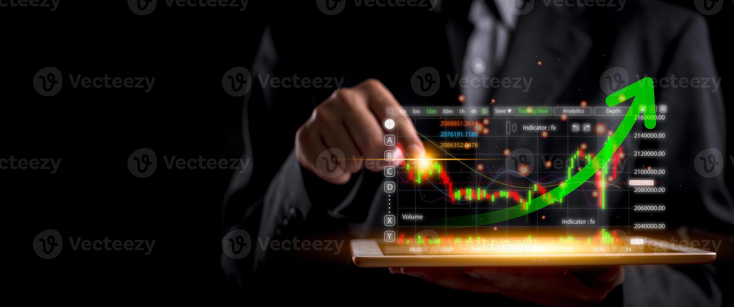 Businessman holding tablet with graph on screen photo