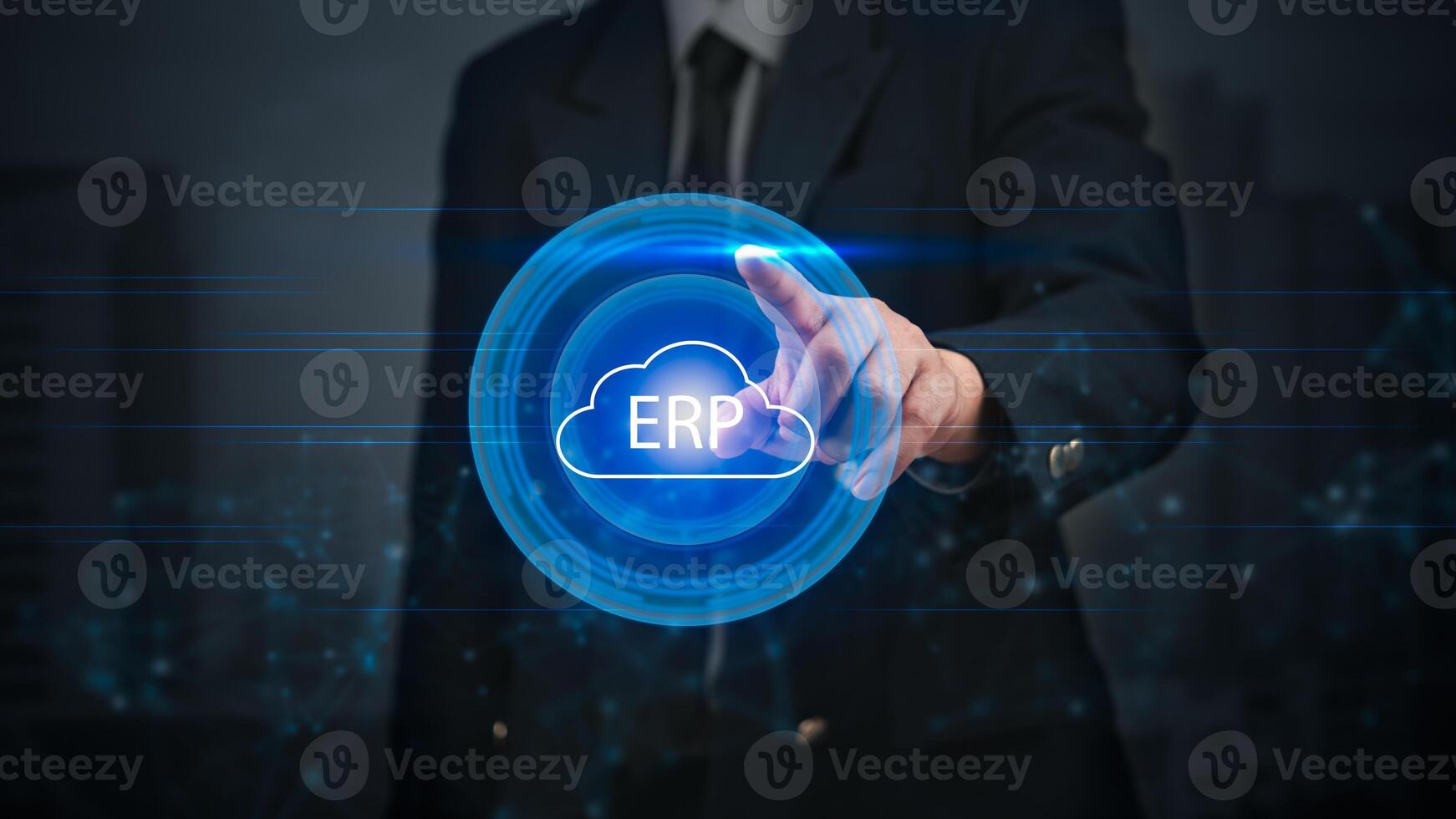 Man in suit touching cloud computing erp button photo