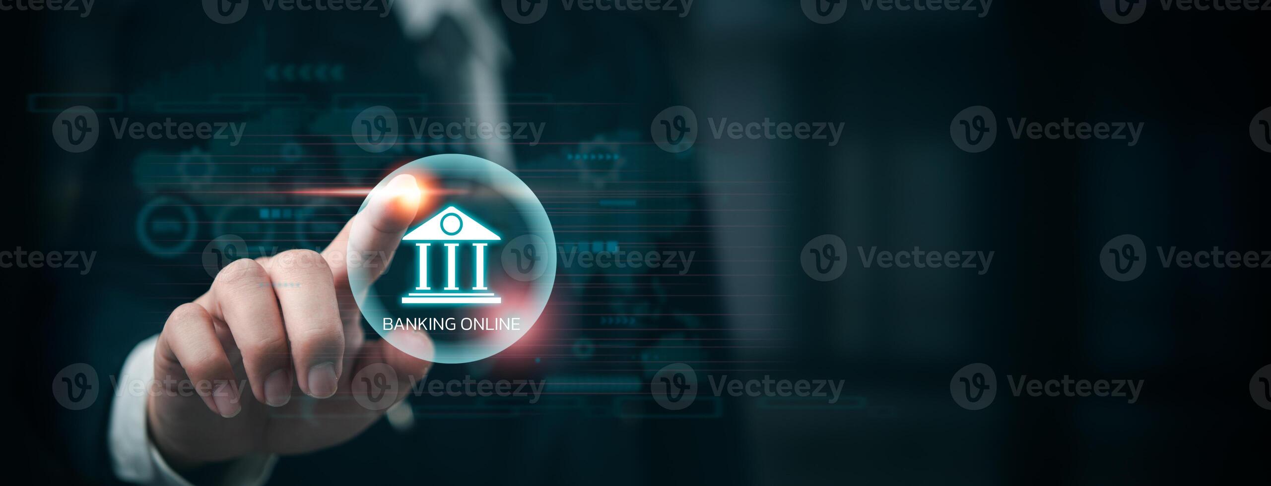 Businessman touching banking icon on virtual screen photo