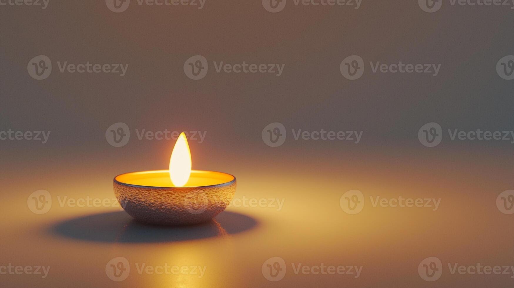 A lit candle on a table with a white background photo