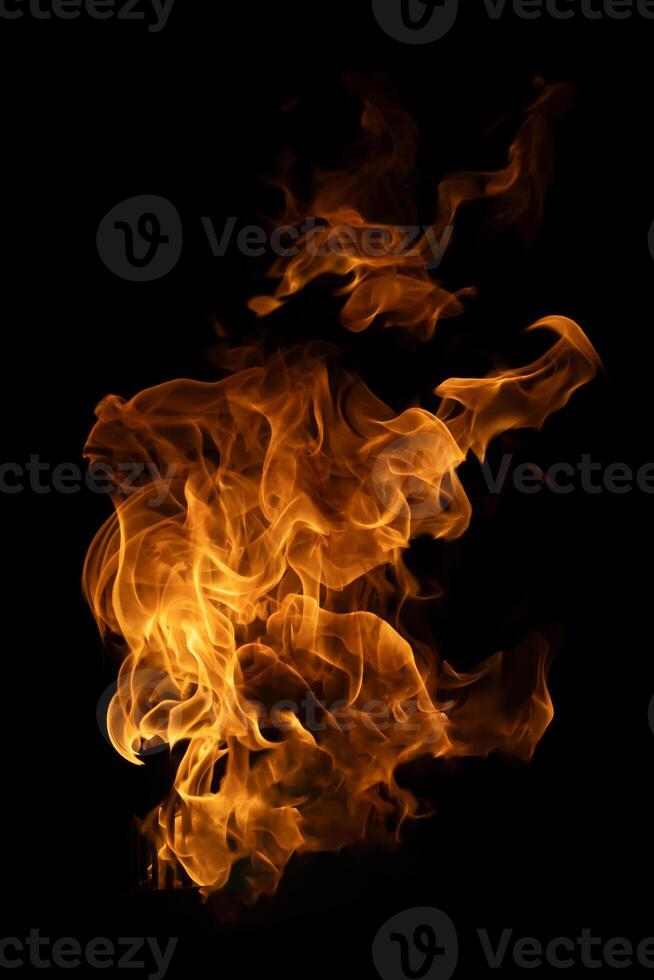 Fire and burning flame of explosive fireball isolated on dark background for abstract graphic design photo