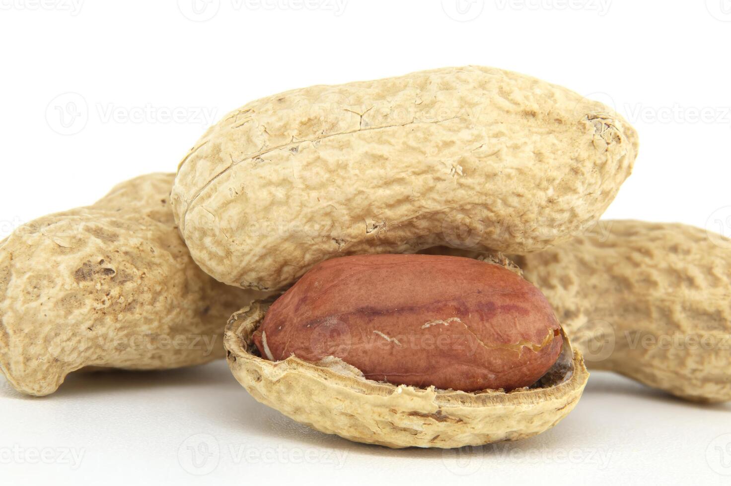Close-Up of Whole Peanuts with Shell and Kernel photo