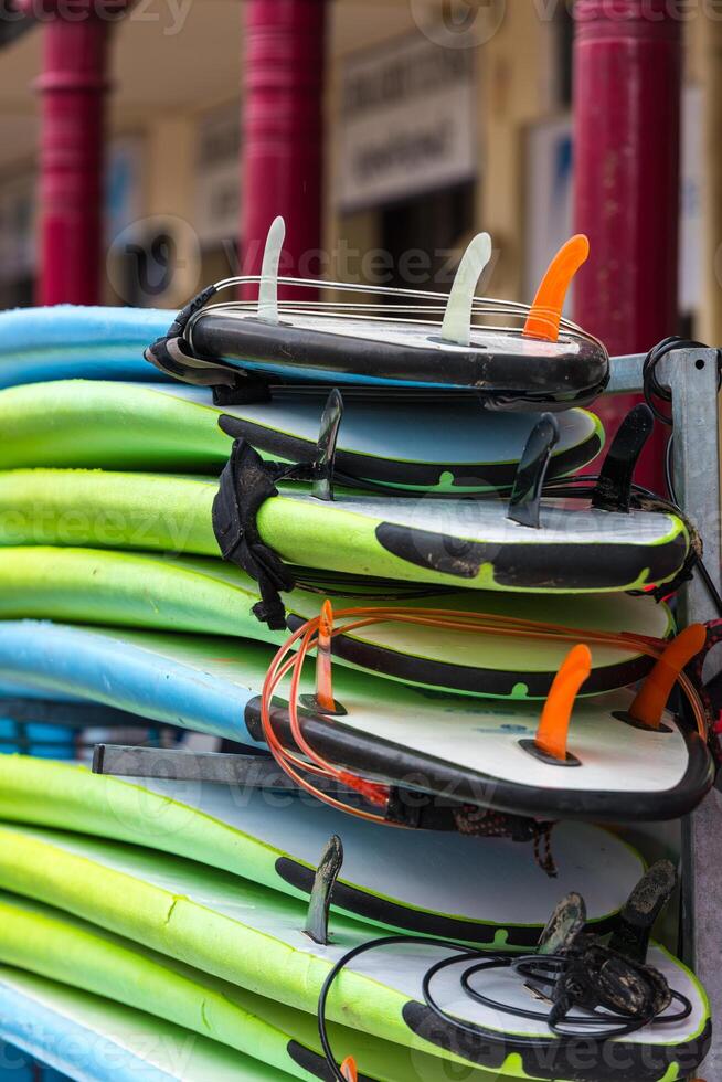 Surf boards in a stack photo