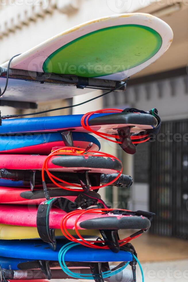 Surf boards in a stack photo